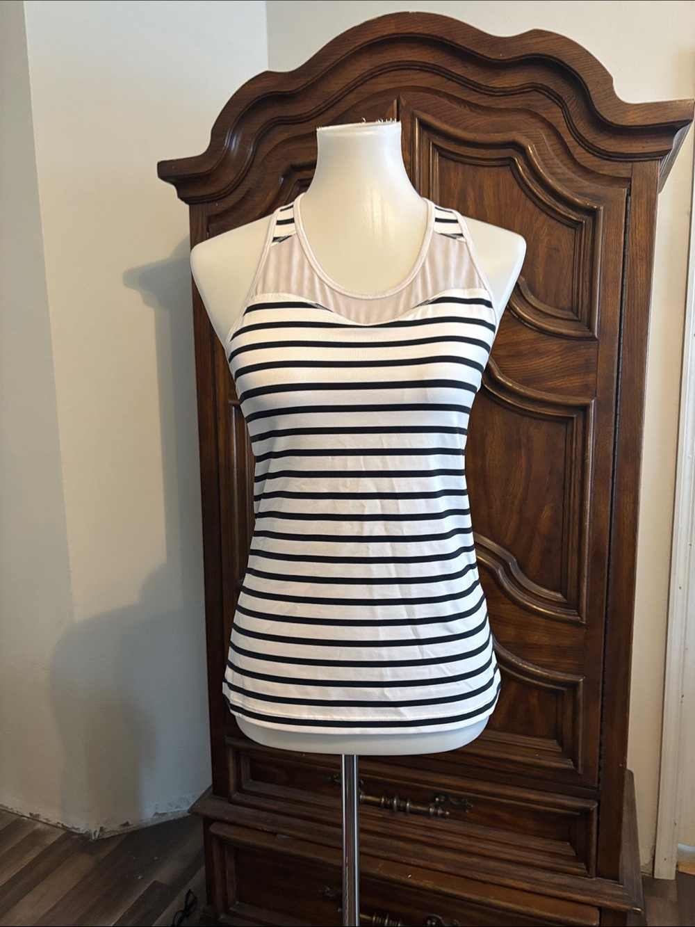 Athleta white and black striped tank top with mesh panel